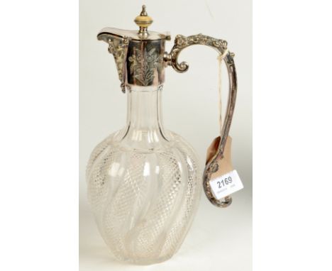 A wrythen cut glass claret jug with plated engraved mount by Joseph Rodgers & Sons, Sheffield, with an ivory finial, height 2