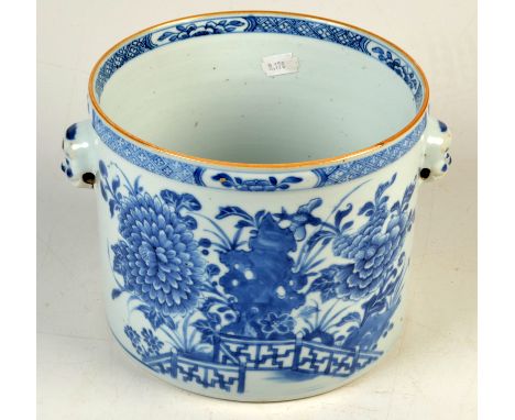 A Chinese export blue and white porcelain pail, 18th/19th century, portrait mask handles, decorated with a bridge and foliage