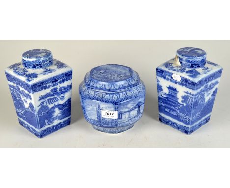 A pair of blue and white square sectioned Ringtons Tea caddies, one lid damaged together with a Maling blue and white Rington