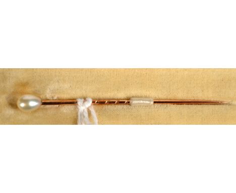 A gold stick pin with pear finial, cased. 