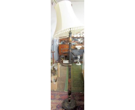 A chinoisere black lacquer standard lamp with shade. 