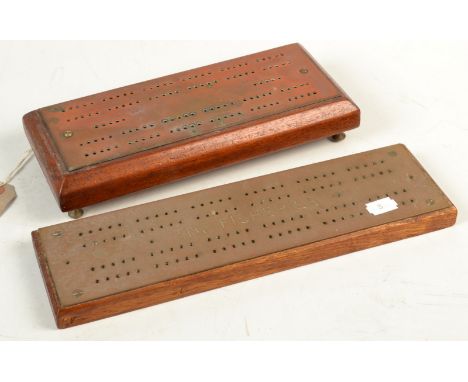 Two brass and hardwood cribbage boards, one engraved "The Fisheries".