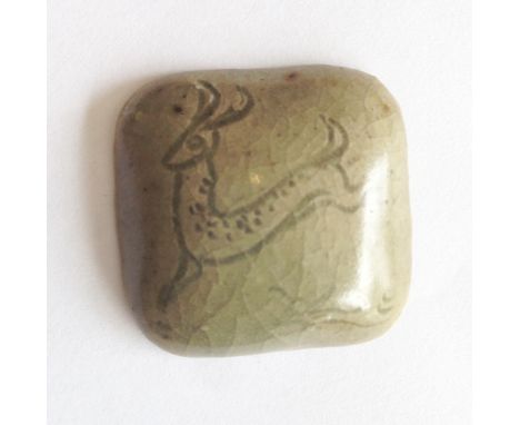 A rare Bernard Leach leaping deer stoneware miniature plaque, celadon glazed with impressed seals to reverse and inscribed BL