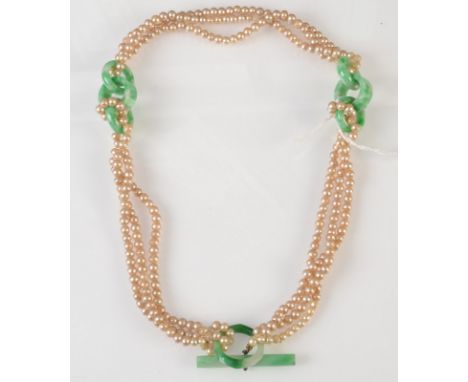 A simulated pearl and imperial green veined jade necklace, the three strands with inserted triple ring jade sections and jade
