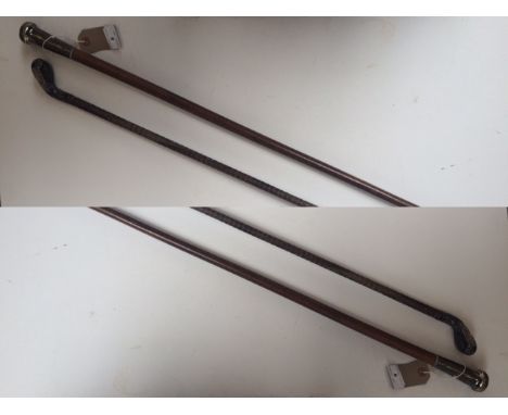 A William and Mary malacca walking cane, the silver coloured handle engraved B * B 1693. Length 88cm, together with a walking