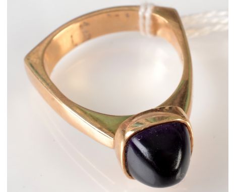 A Danish Arne Johansenn silver gilt triangular form ring, set a square section cabochon amethyst.   Condition Report
Good con