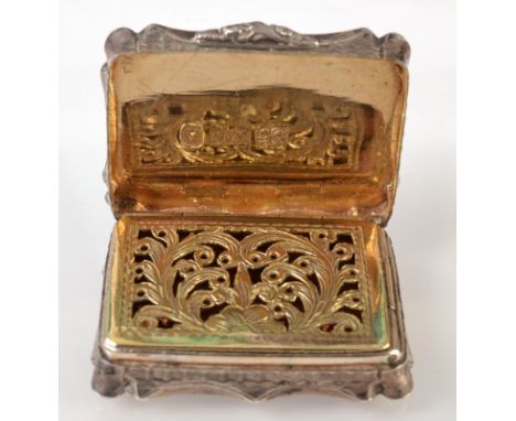 A silver Nathaniel Mills engine turned vinaigrette of shaped outline the lid with a vacant cartouche, hallmarked Birmingham 1