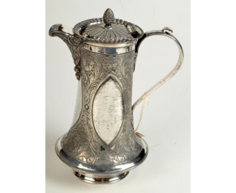 A floral engraved coffee pot with a pineapple finial, height 24cm.