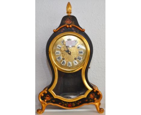 A Zenith Neuchatel pendulum clock in a black floral painted case with a gilt flambeau finial, the movement stamped 511-11 Zen