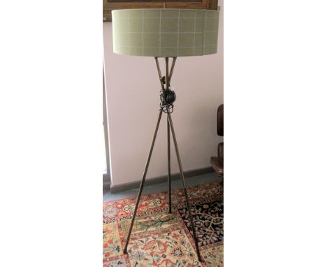 An Arran tripod standard lamp with cylindrical tweed shade. VAT will be charged on the hammer price.

