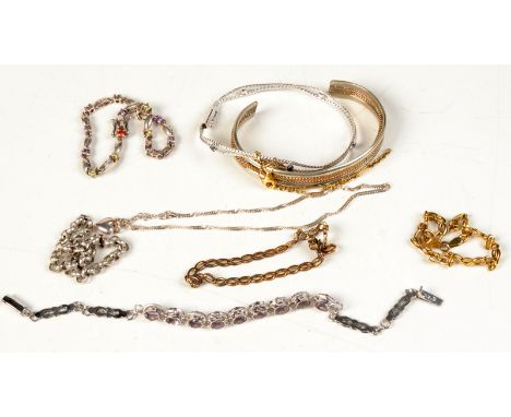 A sterling silver bangle, amethyst bracelet and seven other silver bracelets. 