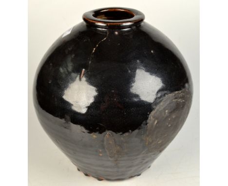 A massive rare early Bernard Leach globular vase, height 34cm.   Cracks, repair. 