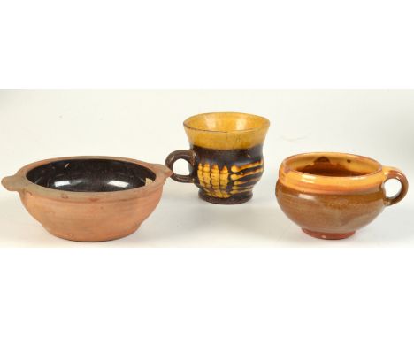 An early Bernard Leach terracotta twin handled bowl. Script personal seal only, maximum width 15cm. Much damage. Together wit