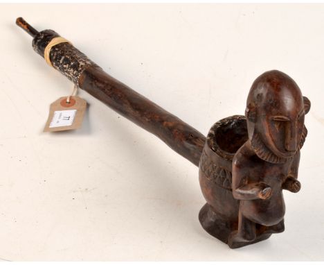 A Mali Dogon smoke pipe, length 48cm.