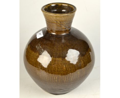 A Leach Pottery large olive green glaze bottle vase by Trevor Corser, height 30cm.