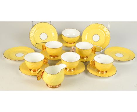 An Aynsley Butterfly part yellow ground tea service variously numbered B1209 and B1399.
Comprising five cups with butterfly h