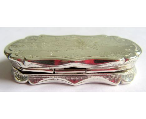 An engine turned picture top, shaped vinaigrette by Nathaniel Mills, the lid shows a coastal scene with houses, figures and s