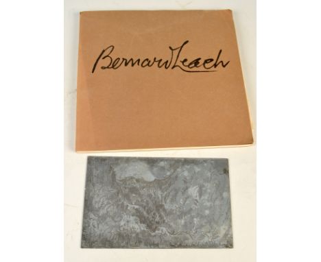 A  Bernard Leach printing plate depicting a Japanese mountainous landscape, monogrammed and dated 1918, for a similar example