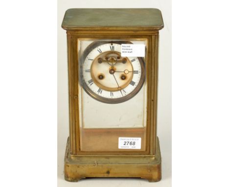 A 19th century French four glass mantle clock with revealed escapement and mercury pendulum, height 27.8cm.  The case has no 