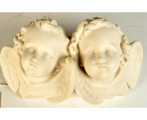 A Copeland Parian Ceramic and Crystal Palace Art Union winged heads moulded wall vase after Malempre 1873, width 22.5cm.
