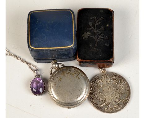 A silver thaler, an amethyst pendant etc. 