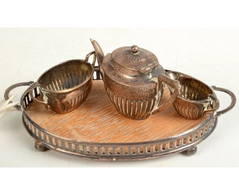 A miniature dolls silver Edwardian three piece tea service with matching twin handle tray, Birmingham 1905.