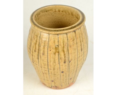 A Bernard Leach cut sided stoneware vase, height 14.5cm. 

  Hairline to rim. 