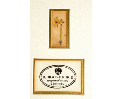 A watercolour jewellery design purporting to be by Faberge, the design in the form of an axe set with a ruby and sapphire is 