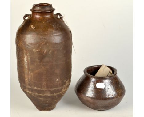 A Chinese jar/water bottle made in the Gobi desert, Manchuria, height 33cm. Inside the jar was found a Leach Pottery referenc
