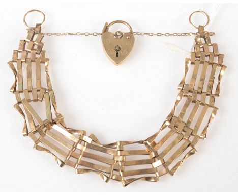 A 9ct gold five bar gate link bracelet with padlock clasp, 10.2g. 