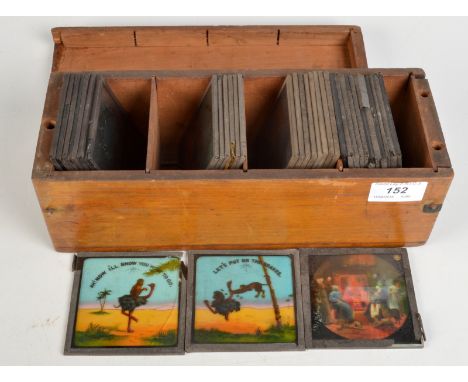 A box of coloured magic lantern slides.