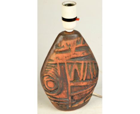 A Tremaen pottery table lamp moulded to each side with an abstract design, height 21cm.