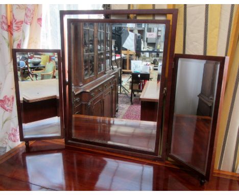 A triple dressing table mirror.
