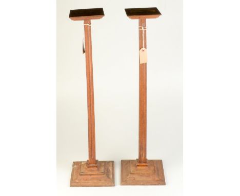 A pair of light oak shop window display stands.  7cm tall.

