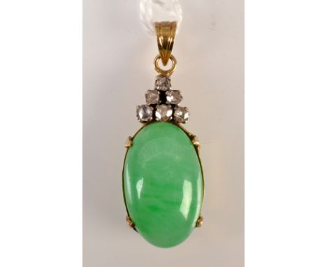 A Chinese yellow gold pendant set with jade and diamonds. 