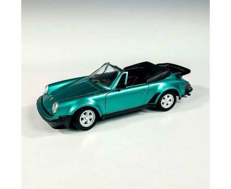 Replica die cast model Porsche in a green exterior and black interior. With moveable parts. Dimensions: 10.25â€L x 4.5â€W x 3