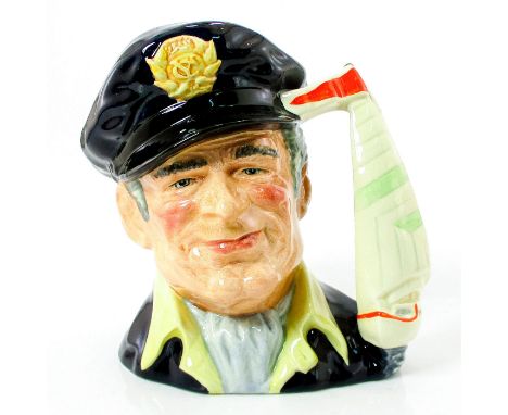 Style Two. Navy blue cap; dark blue jacket; yellow shirt; grey scarf.Royal Doulton backstamp. Artist: Stanley J. TaylorIssued
