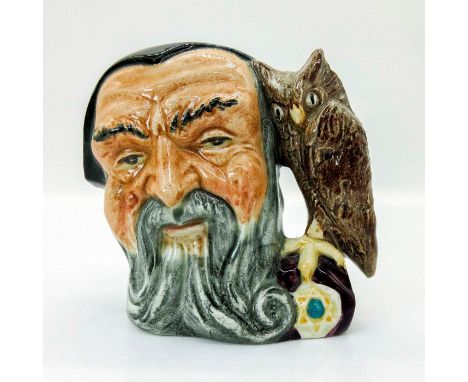 Part of the Mystical Character Series. Black, grey, blown, and purple coloration with owl handle.Royal Doulton backstamp. Thi