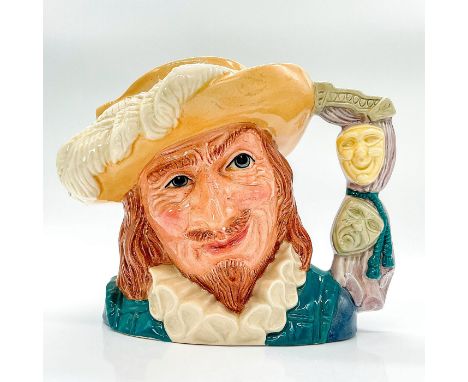 Variation One. Yellow hat, turquoise tunic, white ruff, light brown hair, lavender handle.In the 17th-century comedy, written