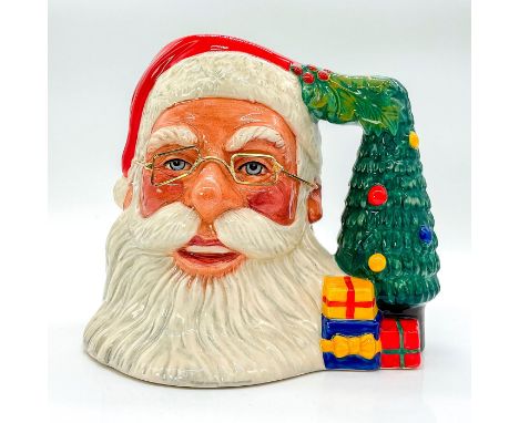 Style Ten. Red, white, blue and yellow coloration.The Santa Claus jug was introduced in 1981 and was the first to undergo ann