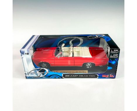 A factory sealed, replica die cast model car Pontiac GTO Convertible, Hurst Edition in a red exterior and white interior. Wit