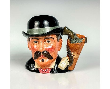 Part of the Wild West Collection. Black and grey hat and coat; dice and gun handle.Royal Doulton backstamp. This item has no 