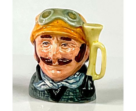 Yellow hat; green coat; white scarf.Royal Doulton backstamp. Artist: David B. BiggsIssued: 1973 - 1983Dimensions: 2.5"HManufa