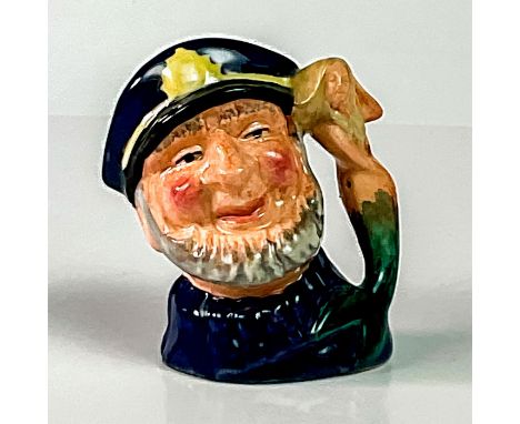 Variation One. Dark blue fisherman's jersey; mermaid has blue tail.When the miniature Old Salt jug was launched in 1984, it h