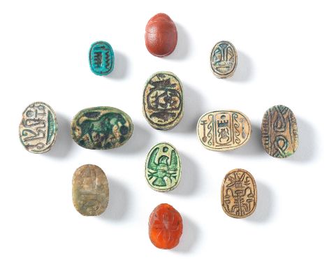  Twelve Egyptian scarabs Middle Kingdom-Late Period, circa 1981-525 B.C.Two carnelian scarabs one plain the other with flower