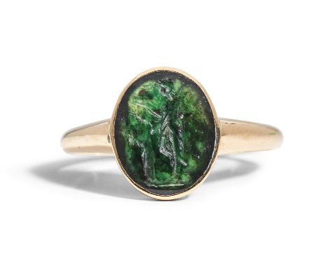 A Roman chrome chalcedony intaglio  Circa 1st-3rd Century A.D.Engraved with the youthful figure of Bonus Eventus,  holding a