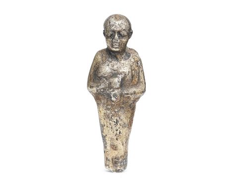 An Egyptian silver amulet of Ptah Late Period-Ptolemaic, circa 664-30 B.C.The mummiform god wearing a tight-fitting skull-ca