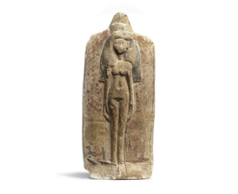  An Egyptian limestone fertility figure plaque New Kingdom, circa 1550-1069 B.C.With much polychrome decoration remaining, th