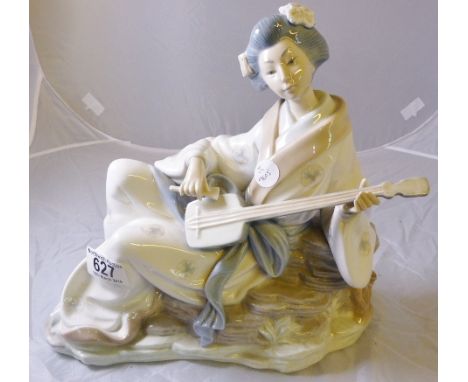 LARGE NAO FIGURINE. Large Nao figurine of a Japanese flute player