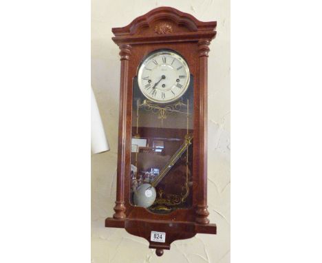 HERMLE WALL CLOCK. Hermle mahogany westminster chiming wall clock